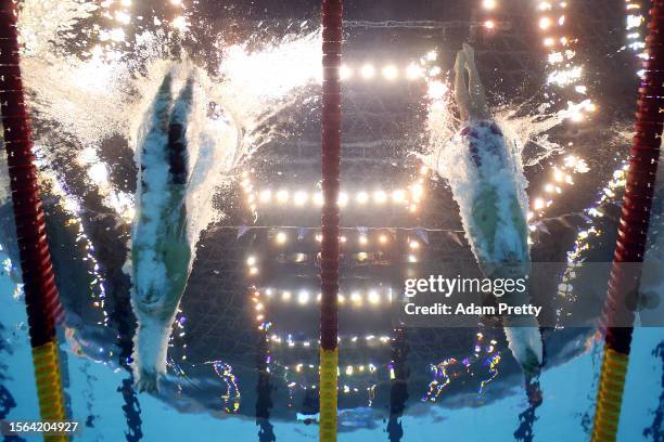 Chase Kalisz of Team United States and Leon Marchand of Team France compete in the Men's 400m Medley Heats on day one of the Fukuoka 2023 World...