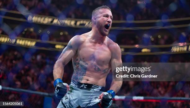 Justin Gaethje celebrates beating Dustin Poirier during their BMF Title Lightweight fight at UFC 291 at the Delta Center July 29, 2023 at the in Salt...