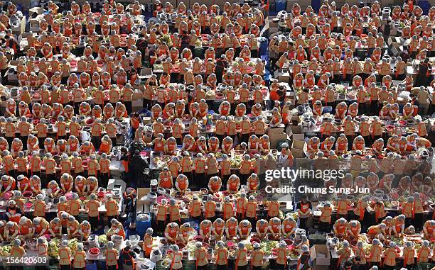 More than two thousands of housewives make Kimchi for donation to the poor in preparation for winter in front of City Hall on November 15, 2012 in...