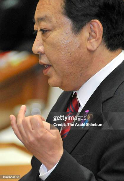 Japanese Prime Minister and ruling Democratic Party of Japan leader Yoshihiko Noda speaks during the one on one debate with the Liberal Democratic...