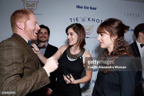 Jesse Tyler Ferguson, Lizzy Caplan and Leslie Sloane at the launch of Tie The Knot, a charity benefitting marriage equality through the sale of...