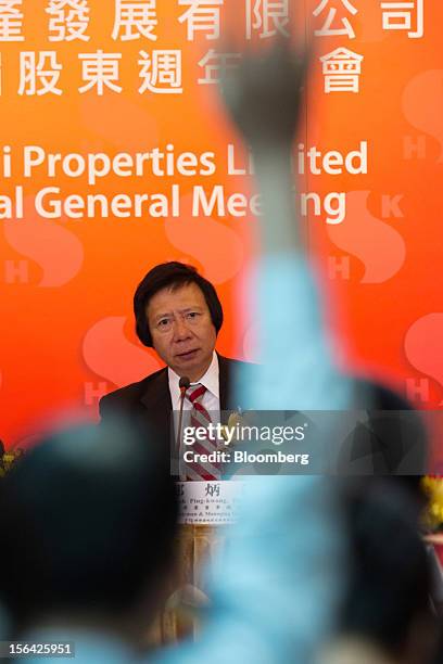 Thomas Kwok, co-chairman of Sun Hung Kai Properties Ltd., looks on as a member of the media raises his hand at a news conference in Hong Kong, China,...