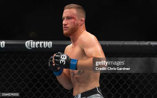 Blood runs down Justin Gaethje's face durng his BMF Title Lightweight fight against Dustin Poirier at UFC 291 at the Delta Center July 29, 2023 at...