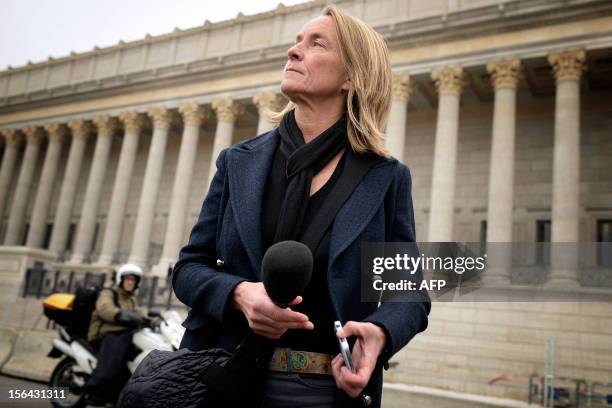 French former tennis player Isabelle Demongeot talks to journalists as she arrives on November 15, 2012 at the Lyon courthouse, to attend the trial...