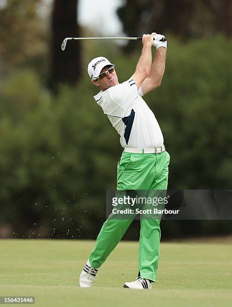 Andrew Tschudin of Queensland hits an approach shot during day one of the Australian Masters at Kingston Heath Golf Club on November 15, 2012 in...