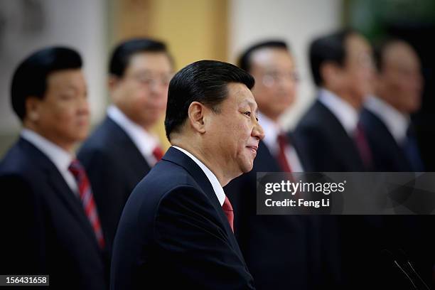 Members of the new Politburo Standing Committee Xi Jinping delivers a speech as Liu Yunshan, Zhang Dejiang, Li Keqiang, Yu Zhengsheng and Wang Qishan...