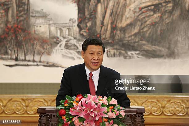 Chinese Vice President Xi Jinping, one of the members of new seven-seat Politburo Standing Committee, delivers a speech after being appointed the new...