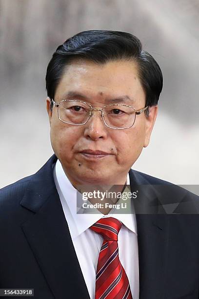 Chinese Vice Premier Zhang Dejiang, one of the members of new seven-seat Politburo Standing Committee, greets the media at the Great Hall of the...