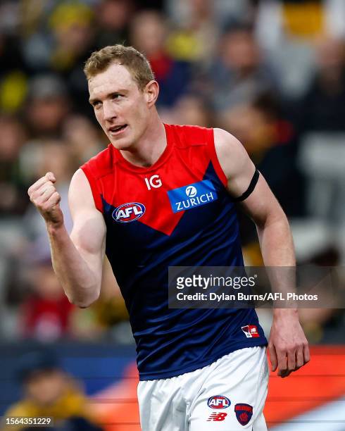 Harrison Petty of the Demons celebrates a goal during the 2023 AFL Round 20 match between the Richmond Tigers and the Melbourne Demons at Melbourne...