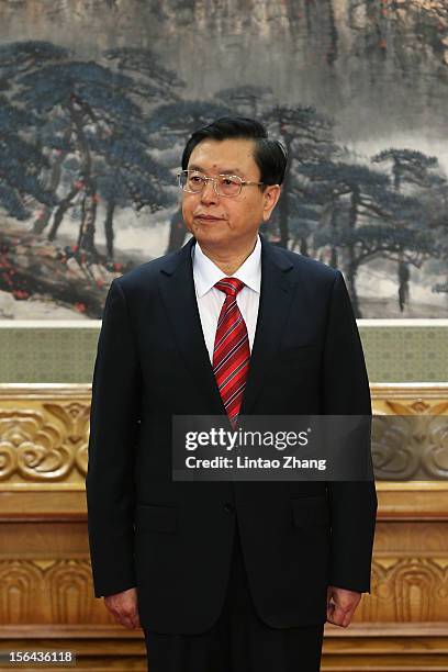 Chinese Vice Premier Zhang Dejiang, one of the members of new seven-seat Politburo Standing Committee, greets the media at the Great Hall of the...