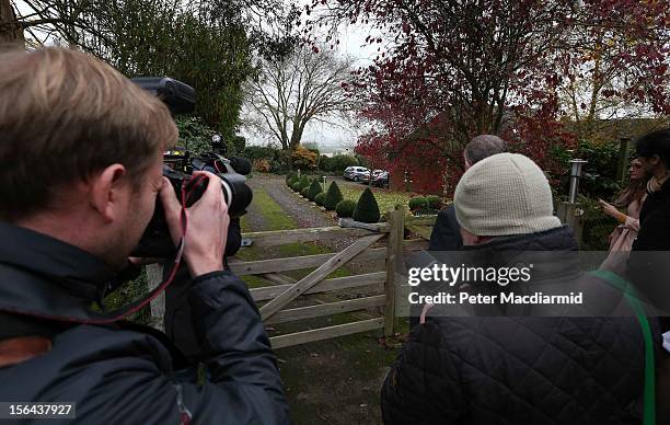 Reporters wait outside a house belonging to former Radio One disc jockey Dave Lee Travis on November 15, 2012 near Leighton Buzzard, England....