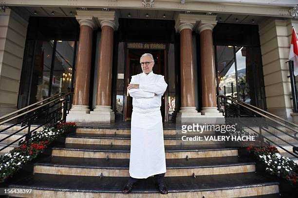 French chef Alain Ducasse poses outside the "Hotel de Paris" in Monaco ahead of celebrations marking the 25th anniversary of his restaurant the...