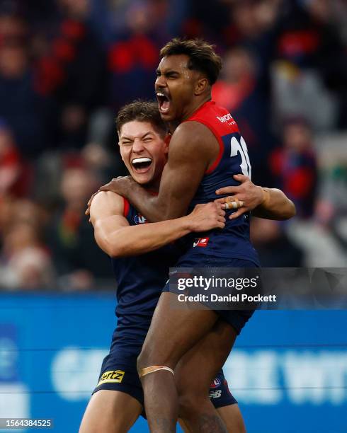 Kysaiah Pickett of the Demons celebrates kicking a goal during the round 19 AFL match between Melbourne Demons and Adelaide Crows at Melbourne...