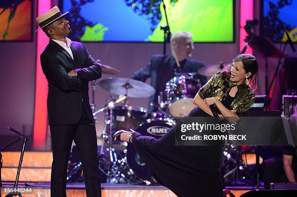 Natalia Lafourcade and Alexandre Pires perform at the 2012 Latin Recording Academy Person of the Year gala, honoring musician Caetano Veloso of...