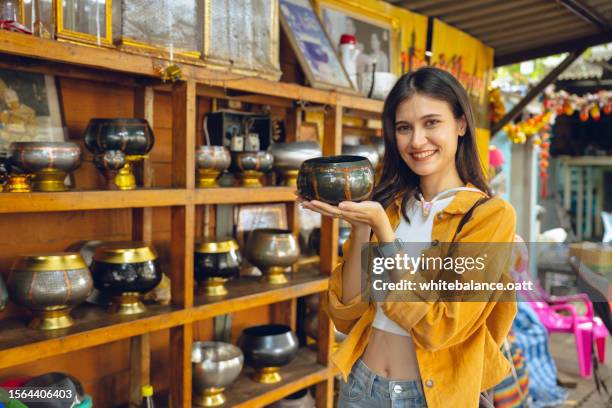 young asian woman enjoying experiential travel. - experiential vacations stock pictures, royalty-free photos & images