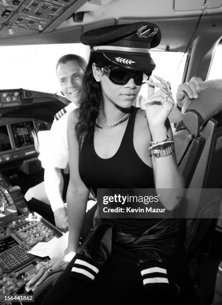 Rihanna sits in the cockpit of the plane before taking off to her first stop on the 777 tour on November 14, 2012. Rihanna's 777 Tour - 7 countries,...