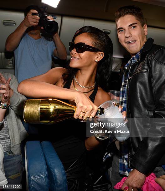 Rihanna celebrates with fans on the plane to her first stop on the 777 tour on November 14, 2012. Rihanna's 777 Tour - 7 countries, 7 days, 7 shows...