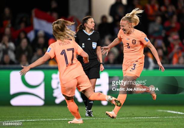 Stefanie Van Der Gragt of Netherlands celebrates with teammate Victoria Pelova after scoring her team's first goal before once disallowed due to...