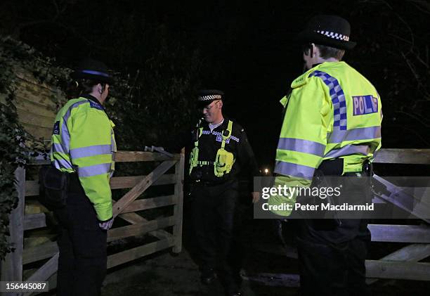 Police attend a house belonging to broadcaster Dave Lee Travis on November 15, 2012 near Leighton Buzzard, England. Police say that they have...