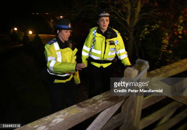 Police attend a house belonging to broadcaster Dave Lee Travis on November 15, 2012 near Leighton Buzzard, England. Police say that they have...