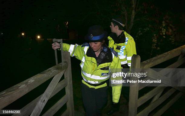 Police attend a house belonging to broadcaster Dave Lee Travis on November 15, 2012 near Leighton Buzzard, England. Police say that they have...