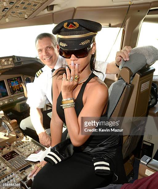 Rihanna sits in the cockpit of the plane before taking off to her first stop on the 777 tour on November 14, 2012. Rihanna's 777 Tour - 7 countries,...