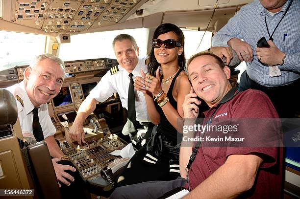 Rihanna sits in the cockpit of the plane before taking off to her first stop on the 777 tour on November 14, 2012. Rihanna's 777 Tour - 7 countries,...