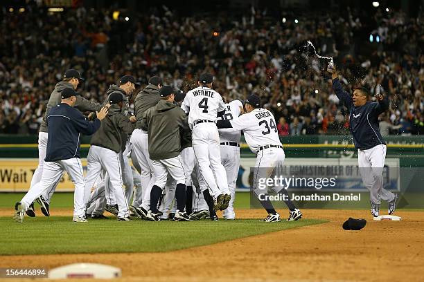 Octavio Dotel of the Detroit Tigers celebrates with his teammates against the New York Yankees during game four of the American League Championship...