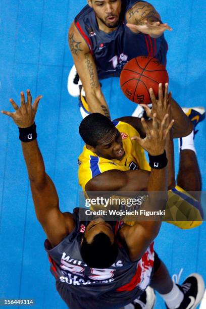 Frank Robinson, #5 of Asseco Prokom Gdynia competes with Shelden Williams, #23 and Brion Rush, #19 of Elan Chalon-sur-Saone during the 2012-2013...