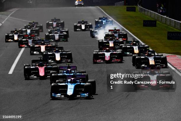 Jack Doohan of Australia and Invicta Virtuosi Racing leads the field into turn one at the start during the Round 10:Budapest Feature race of the...