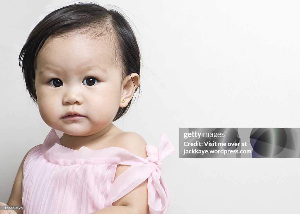 Toddler in a pink dress