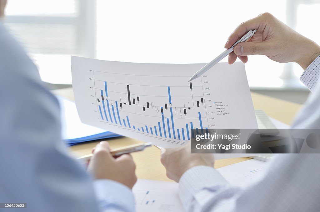 Businessmen  having discussion in office