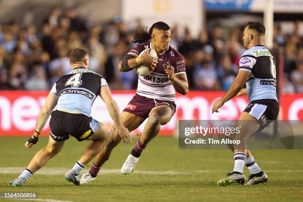 Kelma Tuilagi of the Manly Sea Eagles runs the ball during the round 21 NRL match between Cronulla Sharks and Manly Sea Eagles at PointsBet Stadium...