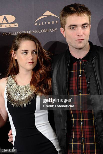 Kristen Stewart and Robert Pattinson attend a photocall for 'The Twilight Saga: Breaking Dawn Part 2' at the Villamagna Hotel on November 15, 2012 in...