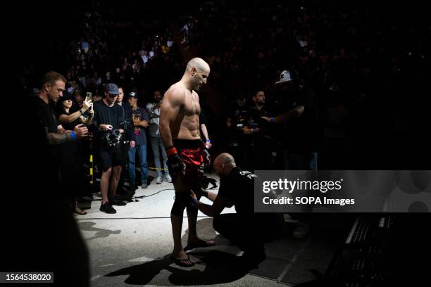 Official conducting a frisk on Gregory 'Greg MMA' Bouchelaghem before he enters the ring for the Hexagone MMA 10 main event. In France, the "Hexagone...