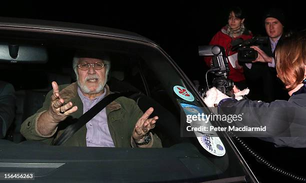 Dave Lee Travis arrives home after leaving Aylesbury police station on November 15, 2012 near Leighton Buzzard, England. Police say that they have...