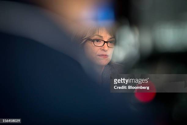 Christina Hull Paxson, president of Brown University, listens during an interview in New York, U.S., on Thursday, Nov. 15, 2012. Paxson was...