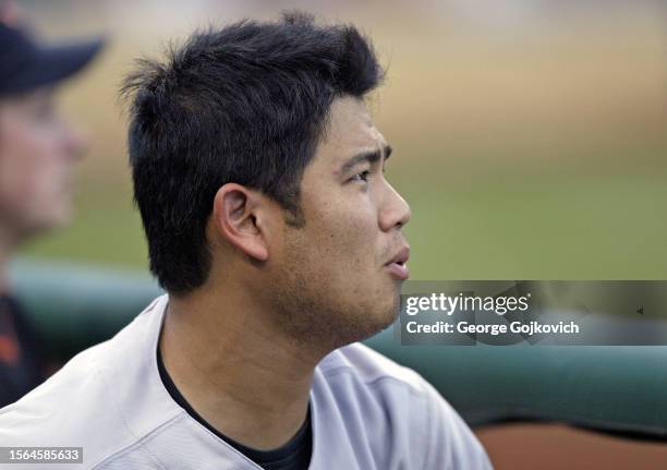 Pitcher Bruce Chen of the Baltimore Orioles looks on from the dugout during a game against the Pittsburgh Pirates at PNC Park on June 7, 2005 in...