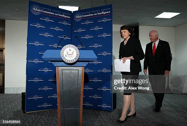 Committee chairman Dianne Feinstein and committee ranking member Saxby Chambliss approach the podium to speak to members of the media after a...