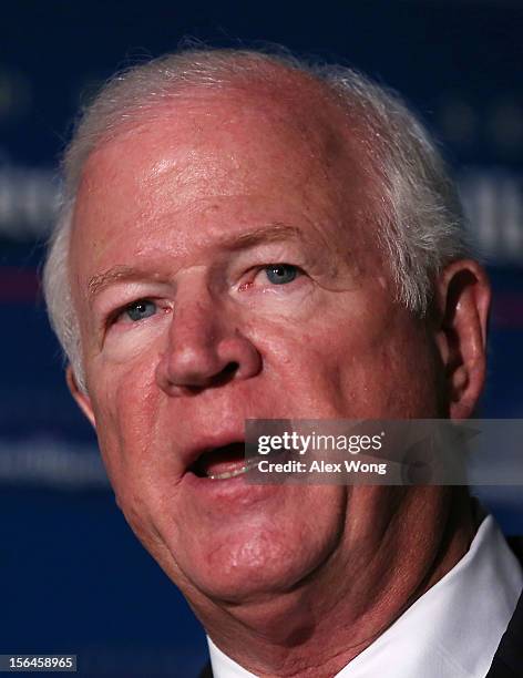 Committee ranking member Saxby Chambliss speaks to members of the media after a closed-door meeting before the Senate Select Intelligence Committee...