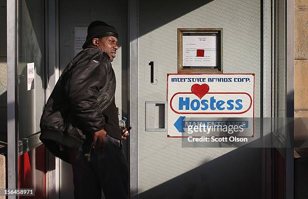 Worker enters the Hostess Brands bakery on November 15, 2012 in Schiller Park, Illinois. Workers with the Bakery, Confectionery, Tobacco Workers and...