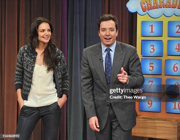 Katie Holmes and Jimmy Fallon play a game of Charades during a taping of "Late Night With Jimmy Fallon" at Rockefeller Center on November 15, 2012 in...