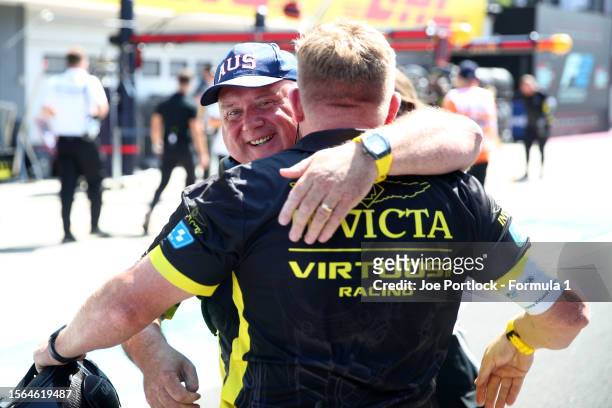 Declan Lohan, Team Principal of Invicta Virtuosi Racing and Paul Devlin, Team Manager of Invicta Virtuosi Racing celebrate in the Pitlane during the...