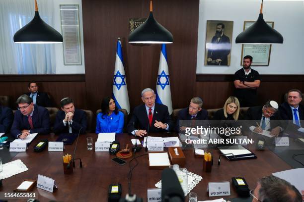 Israel's Prime Minister Benjamin Netanyahu speaks during the weekly cabinet meeting in the prime minister's office in Jerusalem on July 30, 2023.