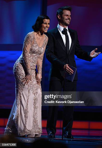 Presenters Nelly Furtado and Mark Tacher speak onstage during the 13th annual Latin GRAMMY Awards held at the Mandalay Bay Events Center on November...