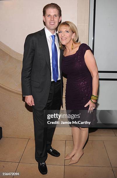 Eric Trump and Lisa Lampanelli attend Henri Bendel holiday window unveiling 2012 at Henri Bendel on November 15, 2012 in New York City.