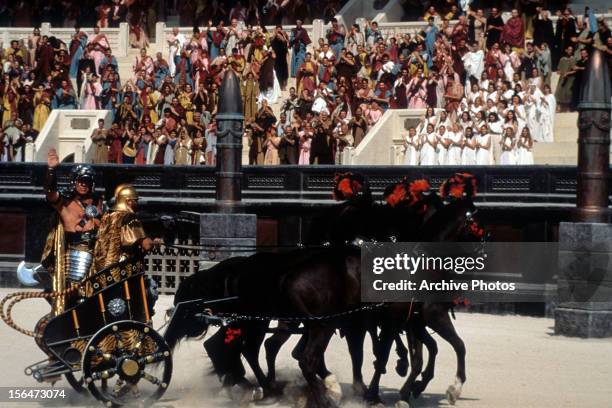 Chariot riding into arena in a scene from the film 'Gladiator', 2000.