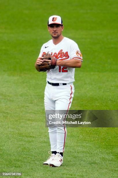 Adam Frazier of the Baltimore Orioles warms up before a baseball game against the Miami Marlins at Oriole Park at Camden Yards on July 16, 2023 in...