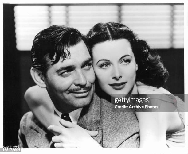 Clark Gable and Hedy Lamarr embracing in publicity portrait for the film 'Comrade X', 1940.