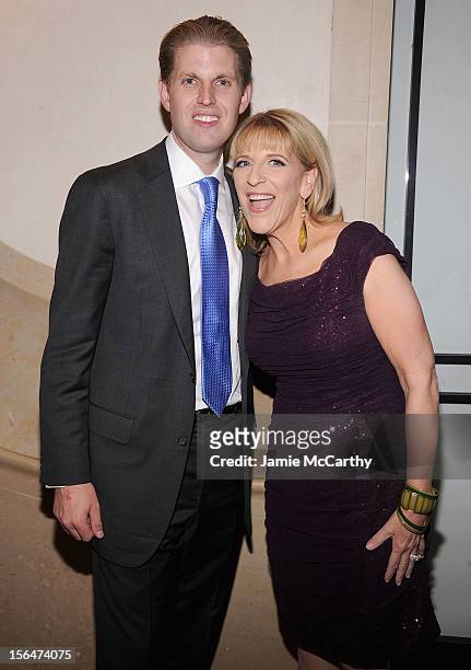 Eric Trump and Lisa Lampanelli attend Henri Bendel holiday window unveiling 2012 at Henri Bendel on November 15, 2012 in New York City.